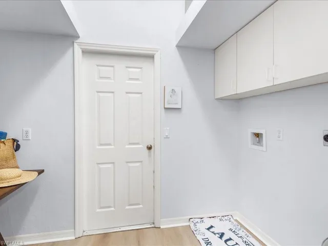 Washer/dryer hookups and rough-in for laundry sink; room for a pantry
