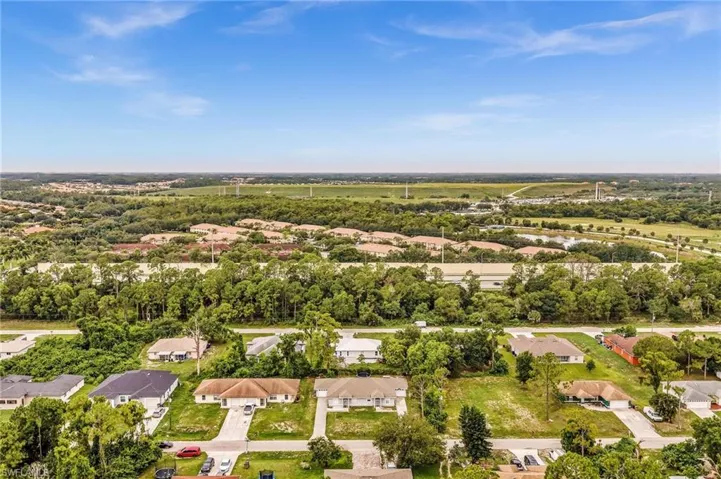 Aerial perspective showcasing a residential area with varied housing styles