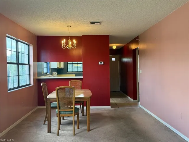 Image back towards kitchen and entrance.