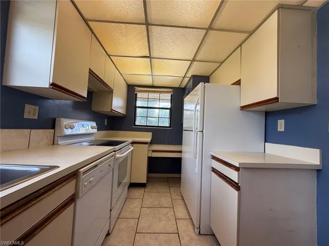 Kitchen with white appliances