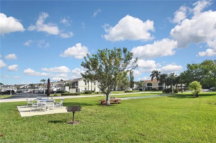 View of community with a yard