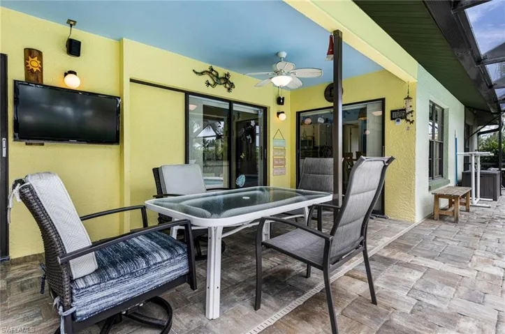 View of patio with ceiling fan