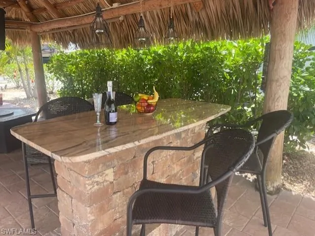 View of patio featuring outdoor dry bar