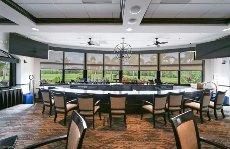 Dining space with ceiling fan and hardwood / wood-style flooring