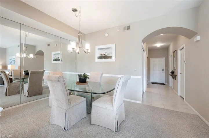 View of carpeted dining space