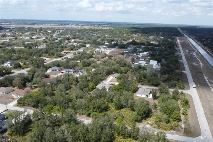 View of property location featuring nearby suburban area