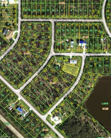 Aerial map of property and surrounding area featuring property boundaries highlighted