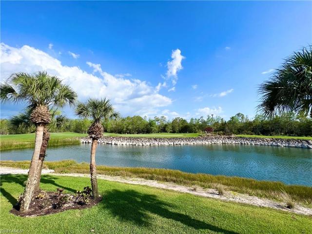 View of golf, water and preserve