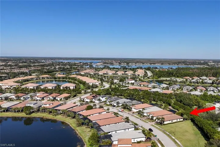 Aerial View Showing Home with Adjacent Green Space