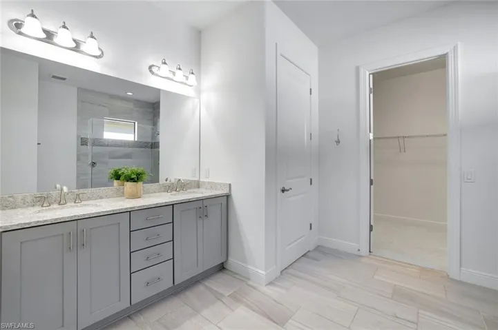 Luxe Owner's Bath with Dual Vanities