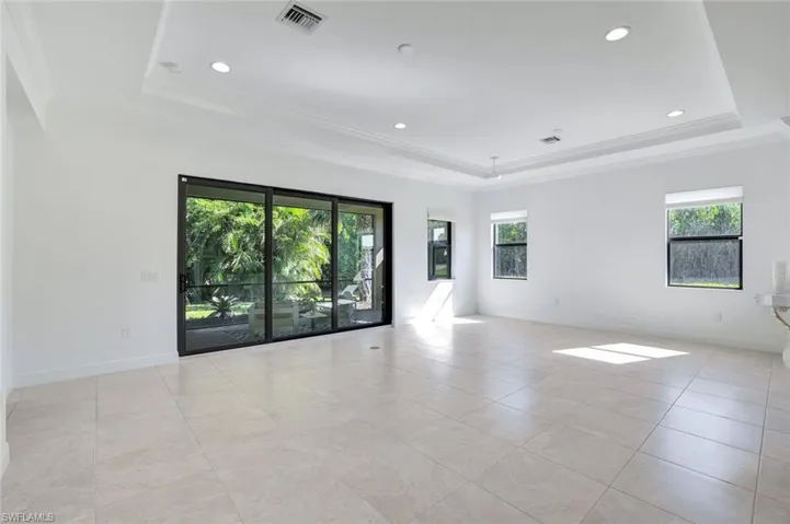 Great Room with Pocketing Sliding Glass Doors to Lanai