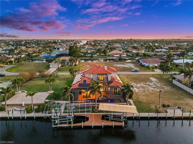 Evening View of the house from the water