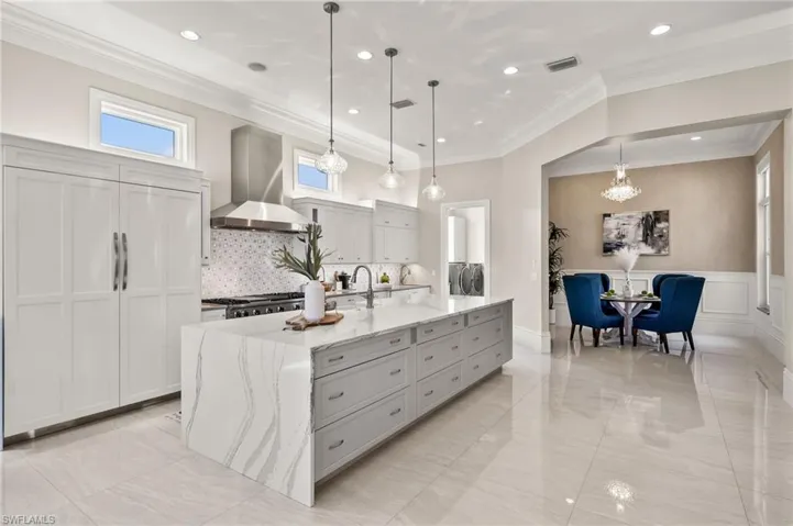 Sub Zero Refrigerator with matching cabinet fronts