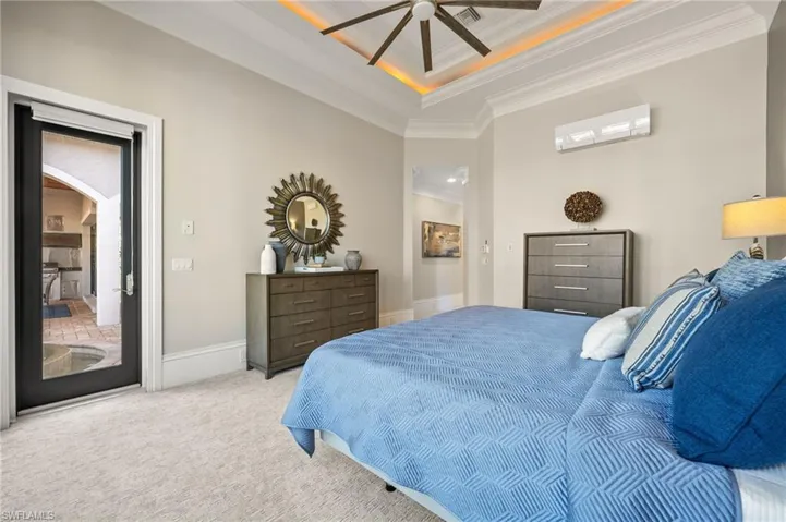 Master Suite opens to the Lanai and Pool