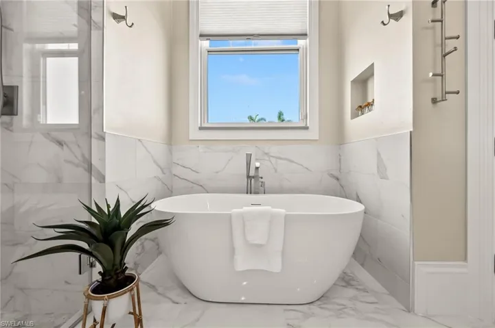 Standalone Soaking Tub in the Master