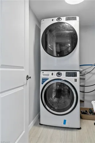 In residence LAUNDRY with washer and dryer and tankless water heater for added convenience!