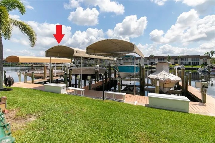 This HOME is just STEPS from YOUR PRIVATE BOAT DOCK, featuring 10K lb LIFT & CANOPY (2022), making it A DREAM COME TRUE for BOATING ENTHUSIASTS!