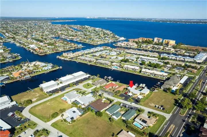DISCOVER THE ULTIMATE BOATER'S PARADISE w/ this GORGEOUS, COMPLETELY REVONATED 1st-FLOOR UNIT, offering DIRECT GULF ACCESS & PREMIUM WATERFRONT LIFESTYLE!