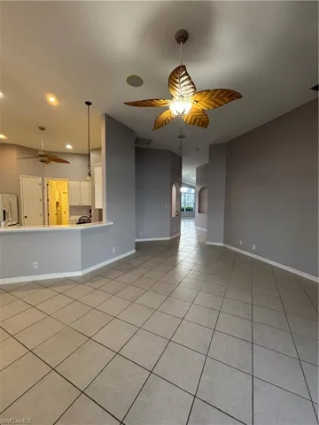 View leads to the Primary Bedroom Suite, Formal dining room, Formal living room, and Front entrance.  Entire interior has been recently painted.