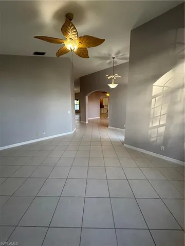 View from the living room to the dining room across the foyer