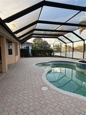 Large enclosed lanai with pool