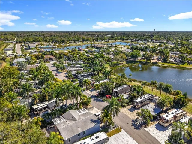 View of property location with nearby suburban area and a nearby body of water