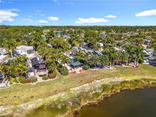 View of property location featuring nearby suburban area and a nearby body of water