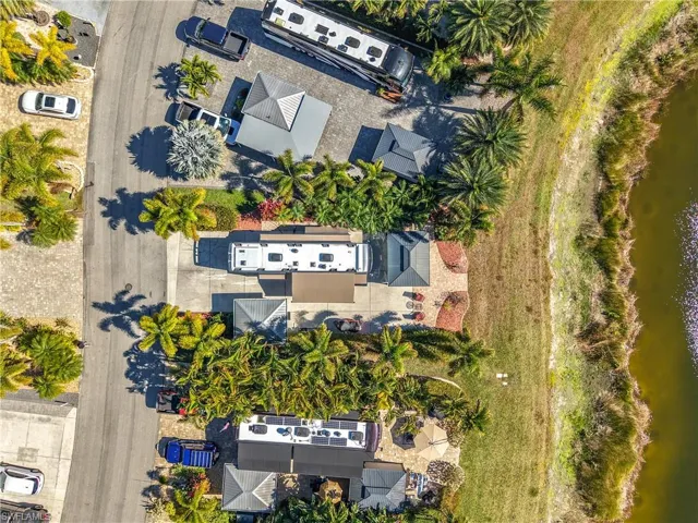 Aerial overview of property's location featuring a nearby body of water
