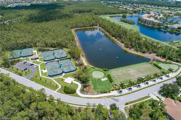 Bird's eye view with a view of trees and a water view