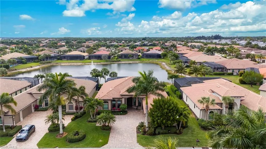Aerial view of residential area with a large body of water