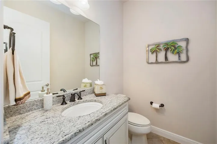 Bathroom featuring vanity and light tile patterned floors