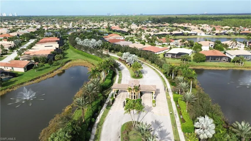 Aerial view of residential area with a large body of water