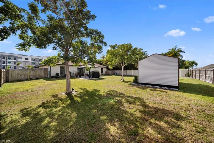 View of fenced backyard