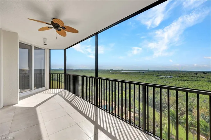 Screened Balcony with ceiling fan looking out over waterways