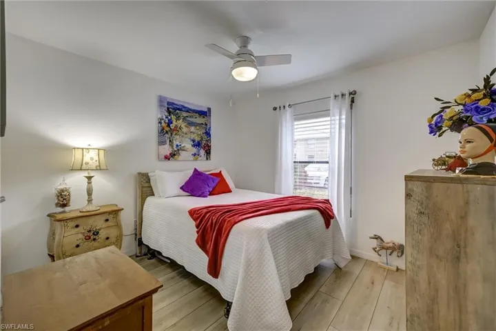 Same newer flooring throughout guest bdrm, & window facing the front of community
