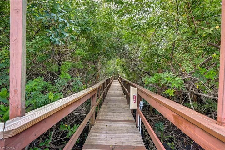 What a pretty scene for taking a stroll down boardwalk through the mangroves & preserve