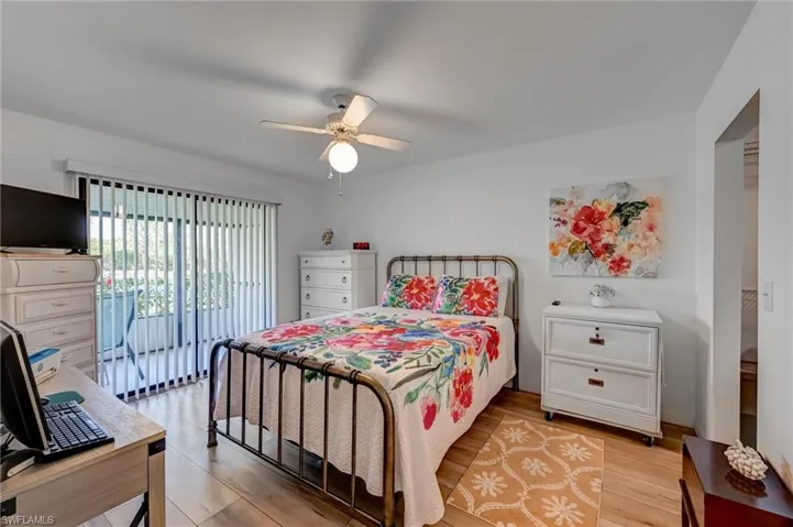 Spacious master/primary bedroom with sliders to Lanai for morning coffee