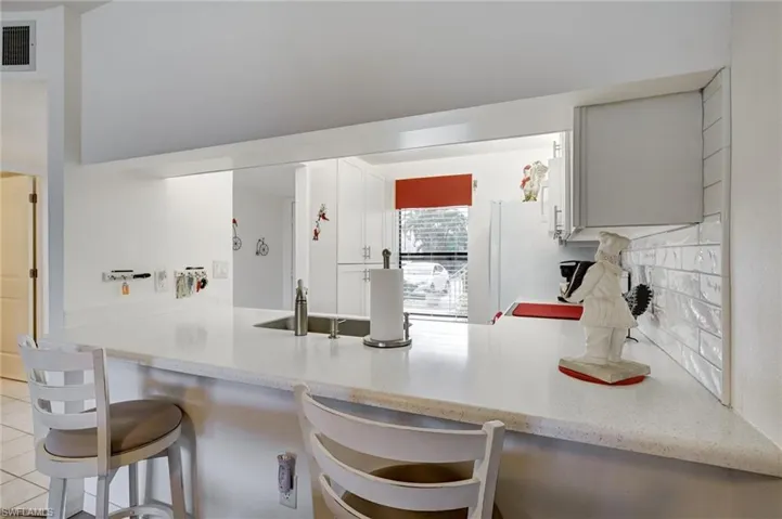 Solid surface countertops and dining/snack bar