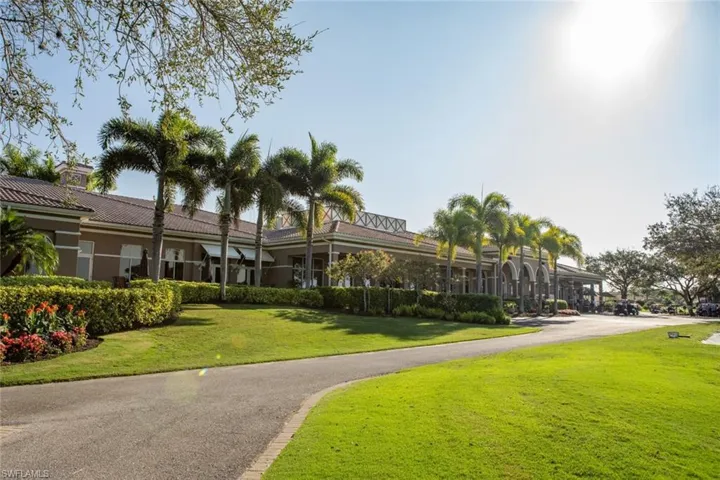View of home's community with a yard