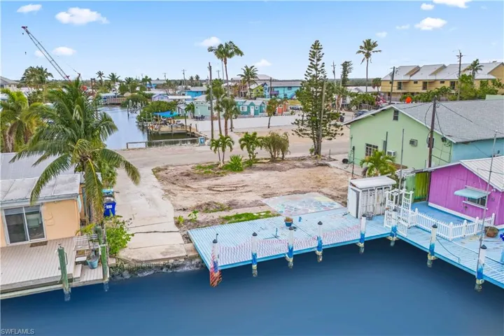 An extensive dock is already in place, perfect for boating, kayaking, or simply enjoying the serene waterfront setting.