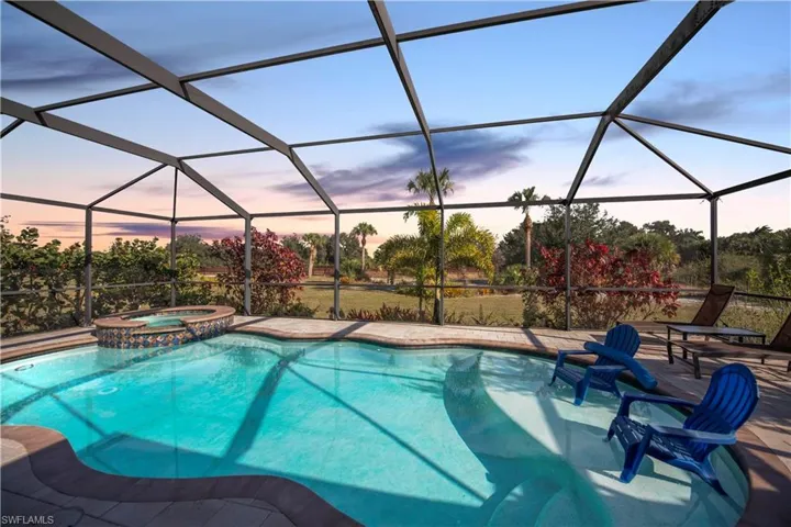 Fully Screened Heated Saltwater Pool with sun shelf