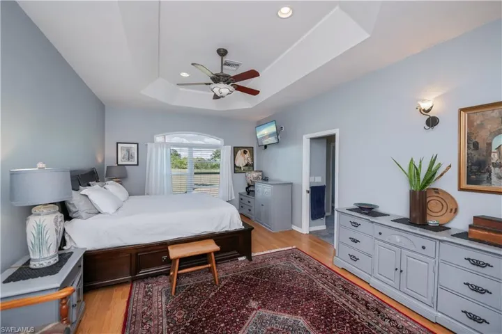 Large Master Bedroom with tray ceiling