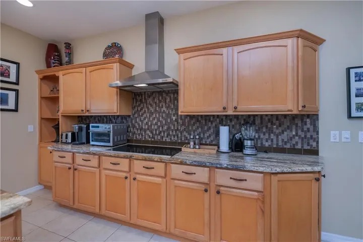 Cook top with custom hood