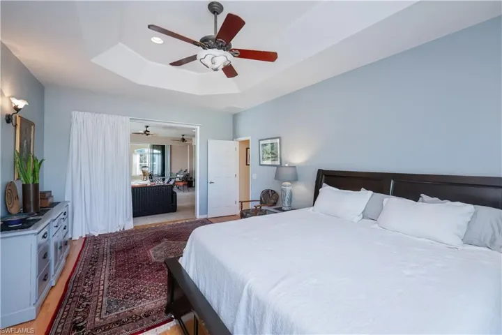 Master Bedroom with sliding glass door to Pool Area