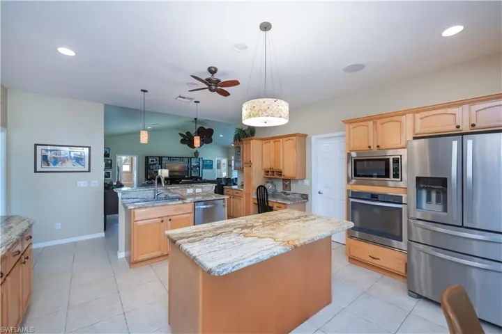 Chefs kitchen, with two islands, cook top and wall oven