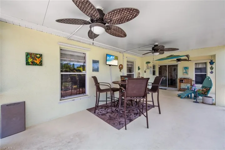 View of patio / terrace featuring ceiling fan and outdoor dining space