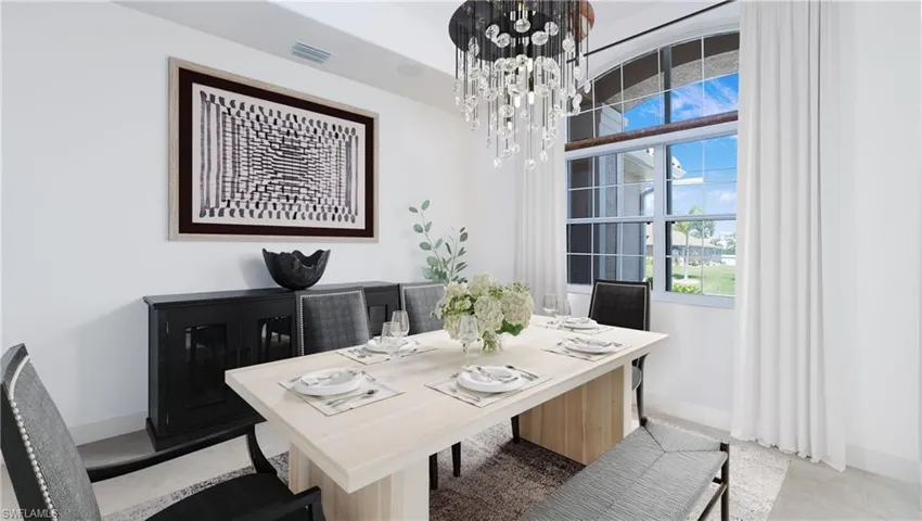 Photo includes reality staging to showcase the possibility of the dining room. Design services included with purchase!