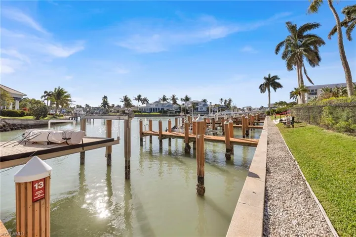 Dock featuring a water view and a residential view