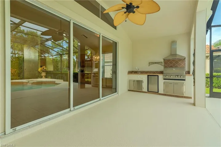 Unfurnished sunroom with a jacuzzi