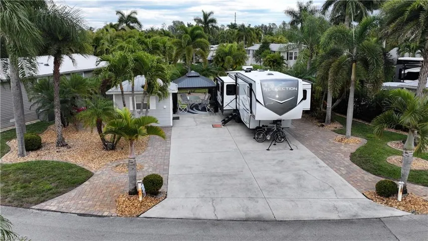 View of patio featuring a gazebo and driveway